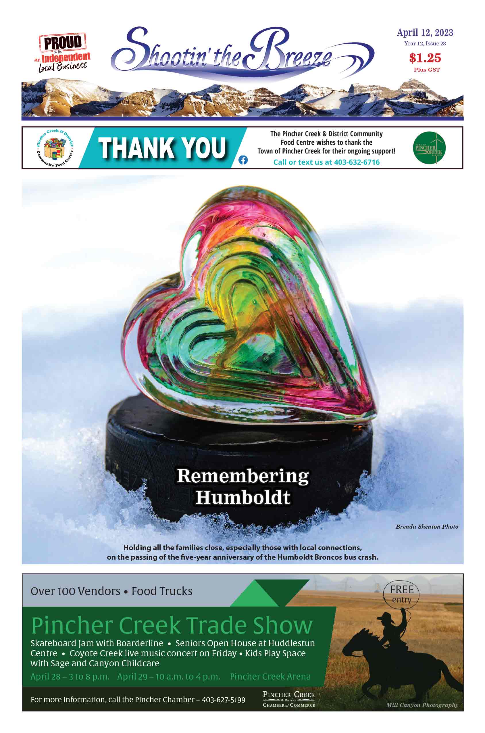Multi-coloured glass heart set on a hockey puck in remembrance of the Humboldt Broncos bus crash