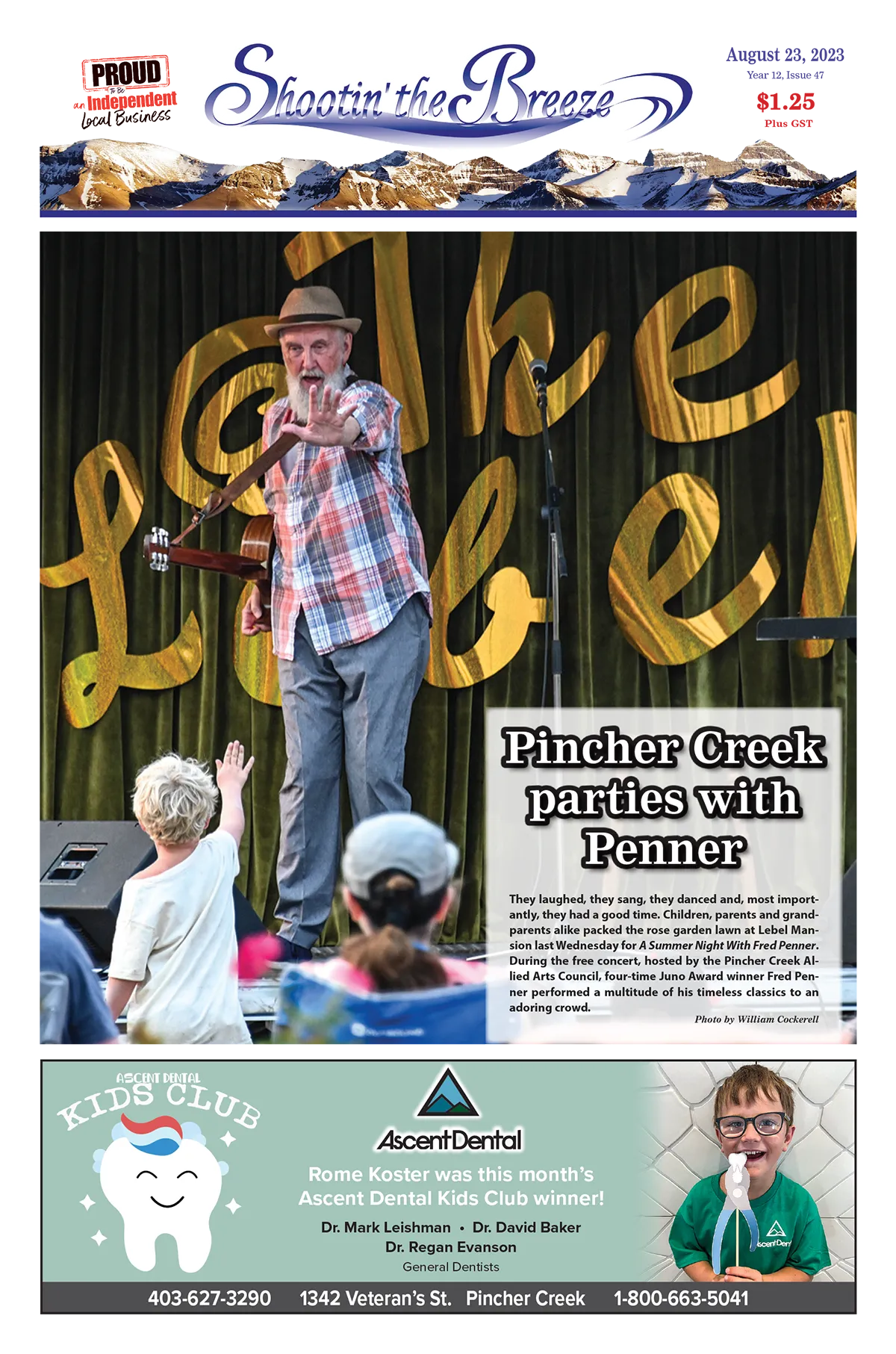 Entertainer Fred Penner high fives with a child in the audience at Pincher Creek's Lebel Mansion