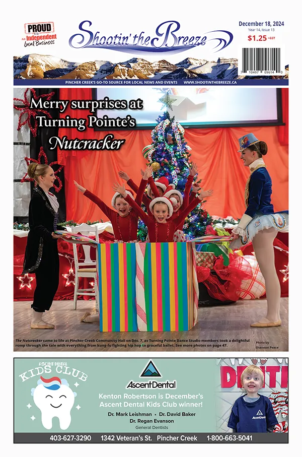 The front page of the Dec. 18, 2024, issue of Shootin’ the Breeze features young girls dressed in red popping out of a giant gift box while a dancer is on either side dressed as characters from the Nutcracker.. The headline reads “Merry surprises at Turning Pointe’s Nutcracker.” Below is an announcement of Ascent Dental’s Kid’s Club winner of the month. Shootin’ the Breeze is a community newspaper and website covering Pincher Creek and area news in southwestern Alberta.
