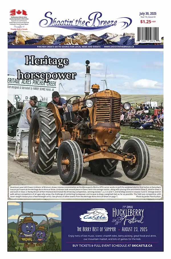 Cowen Linklater of Granum concentrating during tractor pull at Heritage Acres Annual Show