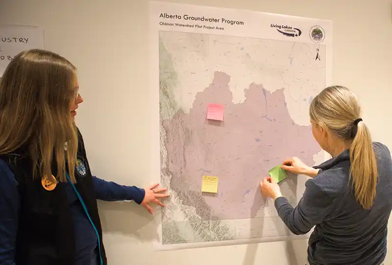 Shannon Frank and community member during groundwater mapping exercise in Lethbridge