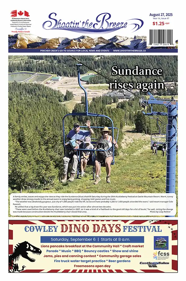 Family riding Sundance chairlift during Huckleberry Festival at Castle Mountain Resort
