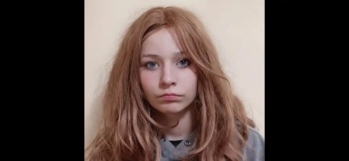 Talon Horton, 16-year-old missing teen with long red hair, light complexion, brown eyes wearing gray collared shirt